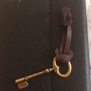 Fossil purse tag key